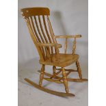 A beechwood rocking chair, 118cm high