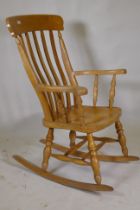 A beechwood rocking chair, 118cm high