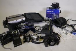 Digital cameras, Panasonic TZ10; Panasonic TZ5; Olympus C5060 wide zoom; GE X500 Aberg Rest; Fuji