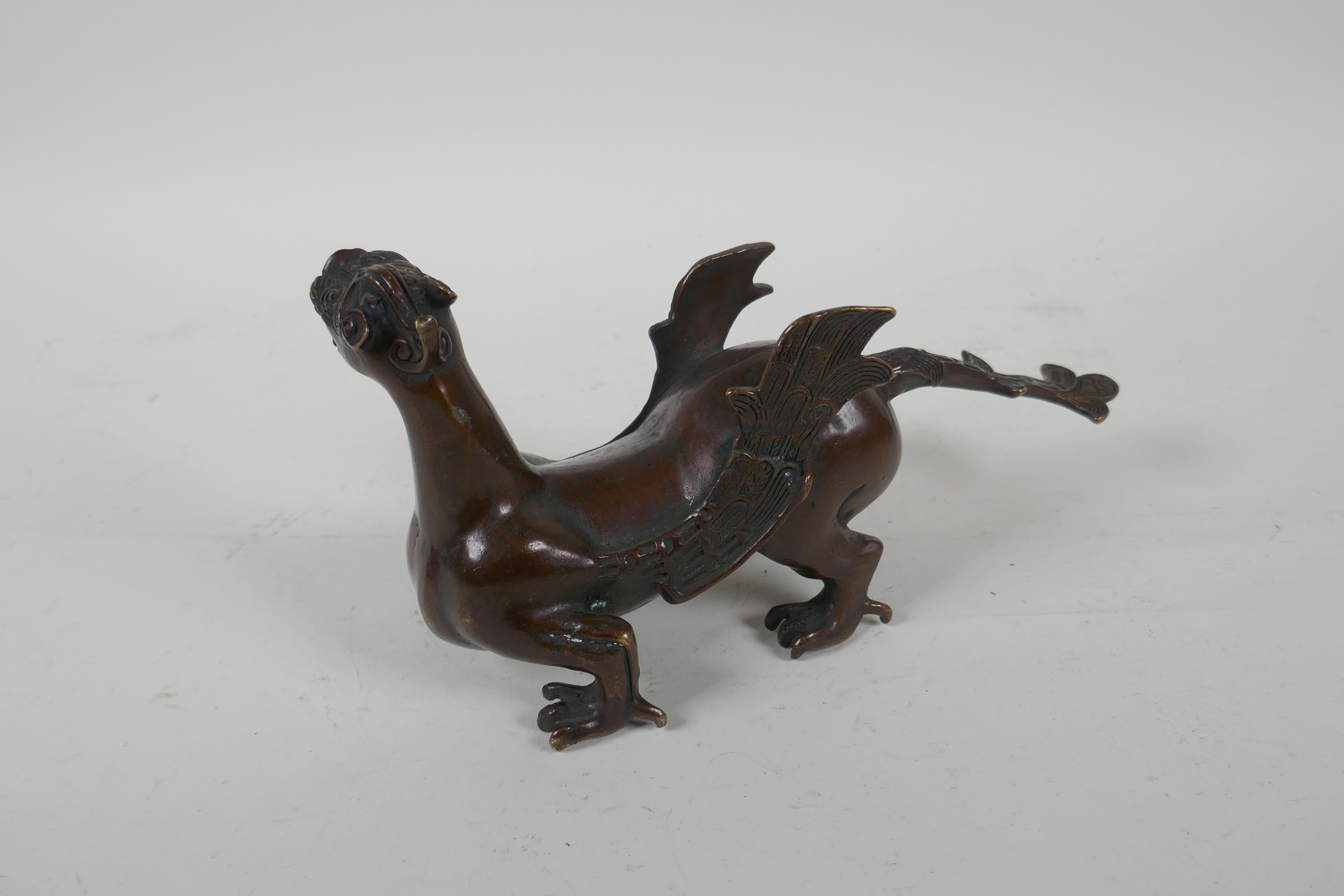 A Japanese filled bronze stylised dragon, 21cm long, indistinct 6 character mark to base - Image 4 of 5