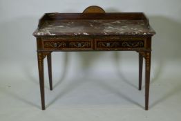 A Victorian inlaid mahogany washstand with rouge marble top and three quarter gallery and two