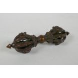 A Tibetan bronze ceremonial vajra, 15cm long