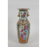 A Chinese C19th Cantonese famille rose porcelain vase with gilt fo-dog handles and decorative panels