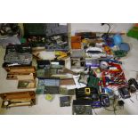 A quantity of tools, socket sets, power tools, hammer drills, circular saw, micrometers, optic