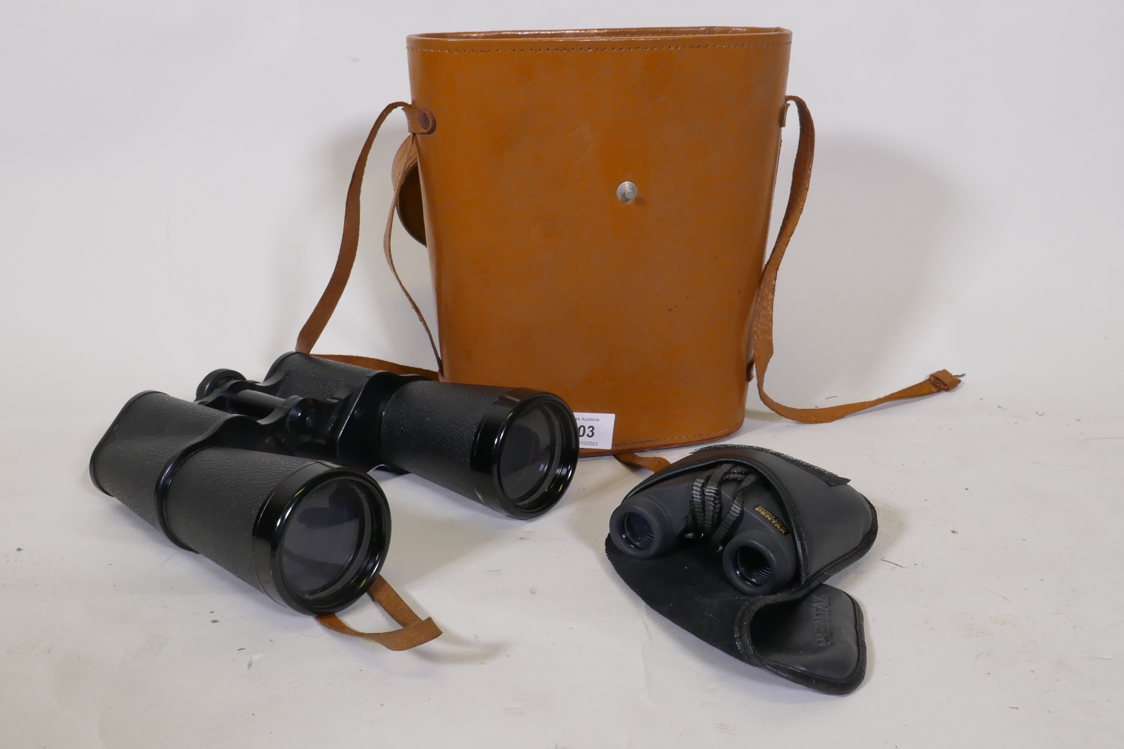 Liebermann and Gortz 25 x 25 field glasses in leather case, and a pair of Pentax 9x20 binoculars