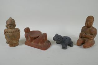 A pre Colombian style pottery ocarina in the form of a frog, and three similar terracotta figures,