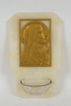 A vintage onyx stoup mounted with a gilt brass portrait of the Madonna in prayer, inscribed Tschudin