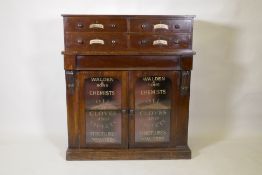 A C19th mahogany side cabinet, with four upper drawers over one frieze drawer and two glazed