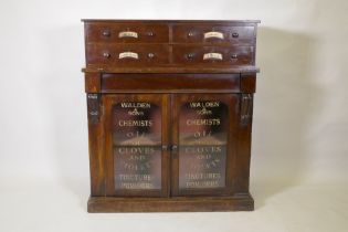 A C19th mahogany side cabinet, with four upper drawers over one frieze drawer and two glazed