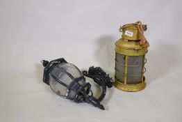 A vintage metal lantern and a wall lantern, 36cm high