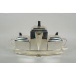 An Art Deco style silver plated three piece tea set, 40 x 22cm