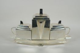 An Art Deco style silver plated three piece tea set, 40 x 22cm