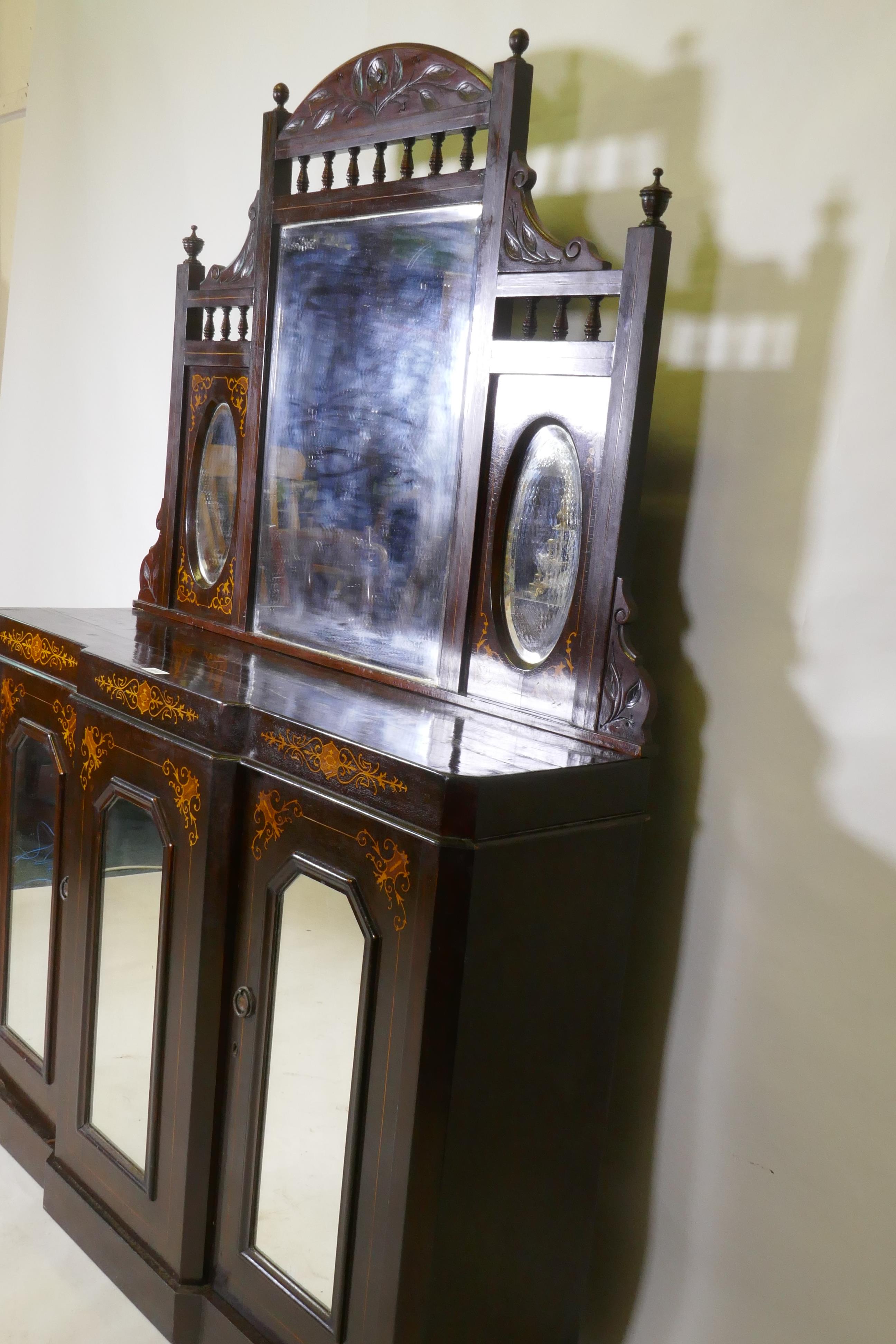 A Victorian walnut mirror backed chiffonier with breakfront base and three glazed doors, 115 x 30 - Image 2 of 4