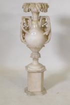 A Victorian alabaster urn on stand, urn 77cm high