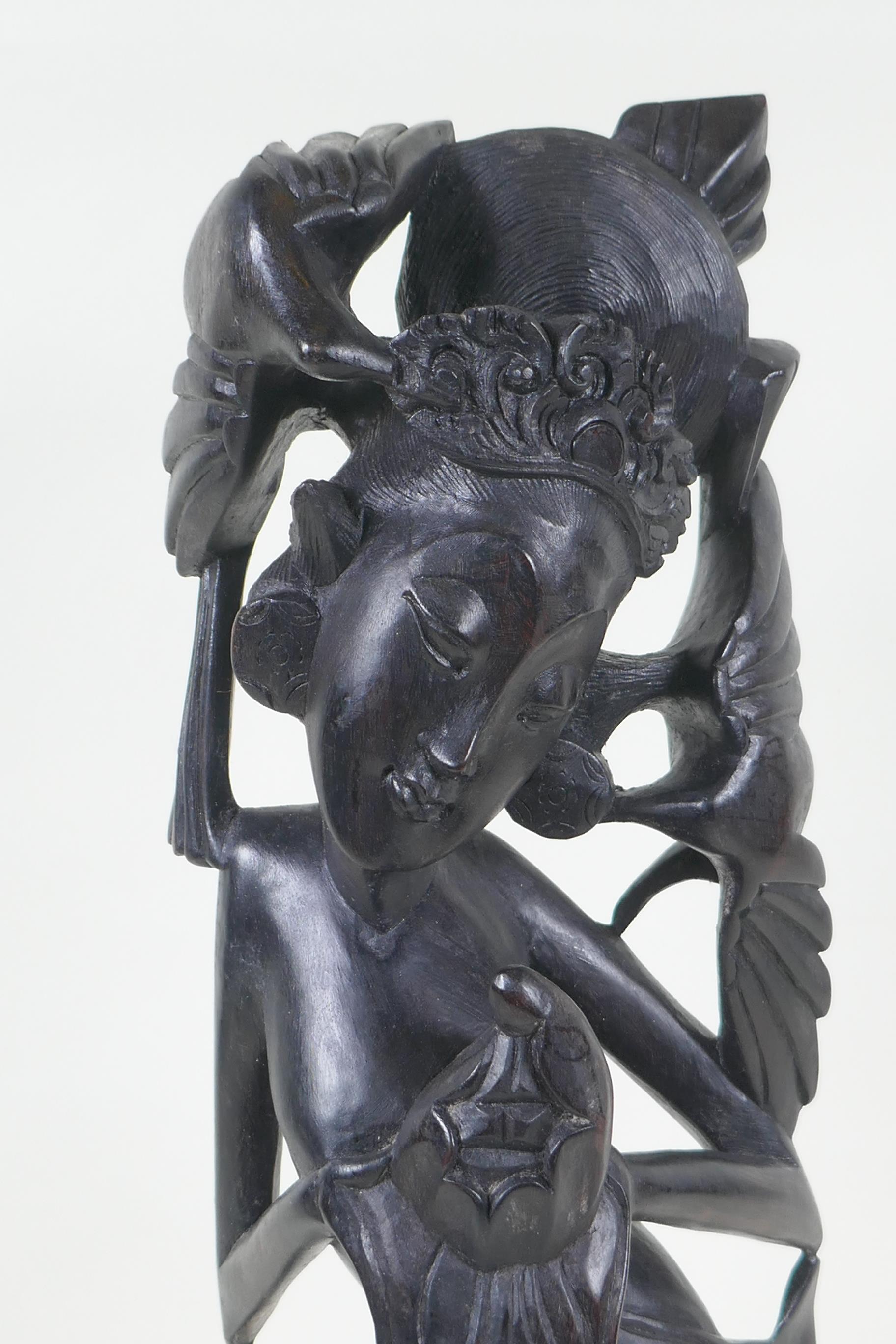 A Balinese carved ebony figure of a dancer, 45cm high - Image 2 of 3