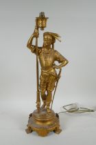 A gilt metal table lamp in the form of a cavalier, 44cm high