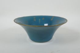 A Chinese teal crackle glazed porcelain bowl with a metal rim, with chased and gilt character