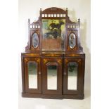 A Victorian walnut mirror backed chiffonier with breakfront base and three glazed doors, 115 x 30