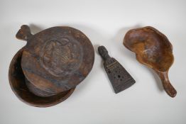 An African antique carved hardwood Kalimba in the form of a figure, together with a carved root wood