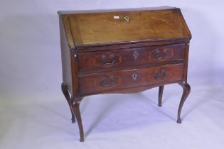 A late C18th/early C19th French Provincial fruitwood and walnut fall front bureau with inlaid