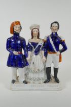 A Victorian Staffordshire  pottery flatback figure group, 'Turkey, England, France', 27cm high