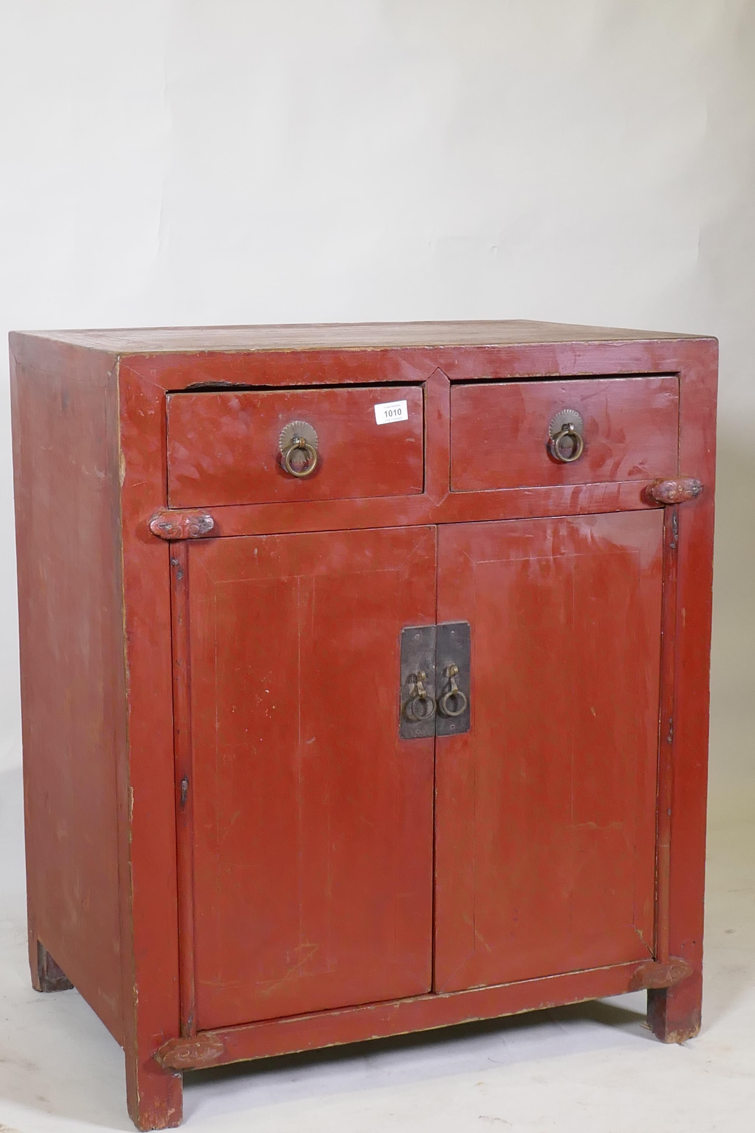 A Chinese red lacquered wood cabinet with two drawers over two doors, 74 x 50cm, 87cm high - Image 2 of 5