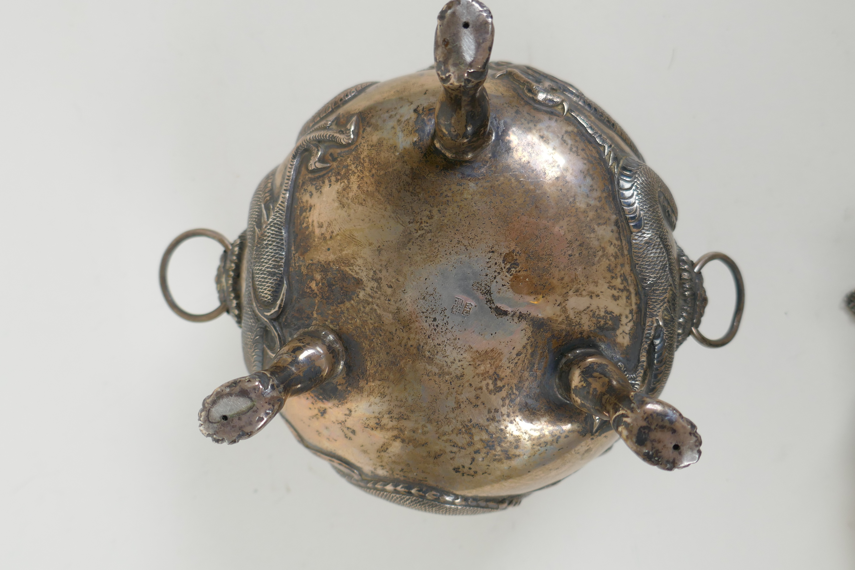 An antique Chinese silver censer on tripod paw feet, with two lion mask handles and repousse - Image 5 of 6