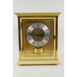Jaeger Le Coultre, 'Atmos' mantel clock, in ivory coloured panel case, brass dial with silver