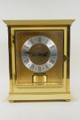 Jaeger Le Coultre, 'Atmos' mantel clock, in ivory coloured panel case, brass dial with silver