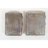 An engine turned silver cigarette case by William Neale & Son, Birmingham 1921, and another by