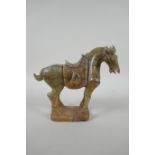 A Chinese carved celadon jade Tang style horse, 18cm high
