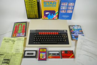 A 1980s Acorn BBC micro computer model B in original box, with manuals, user guides, Chess and