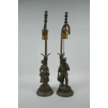 A pair of Dutch gilt bronze figural table lamps of farm workers, after Joseph D'Aste, (1881-1945),