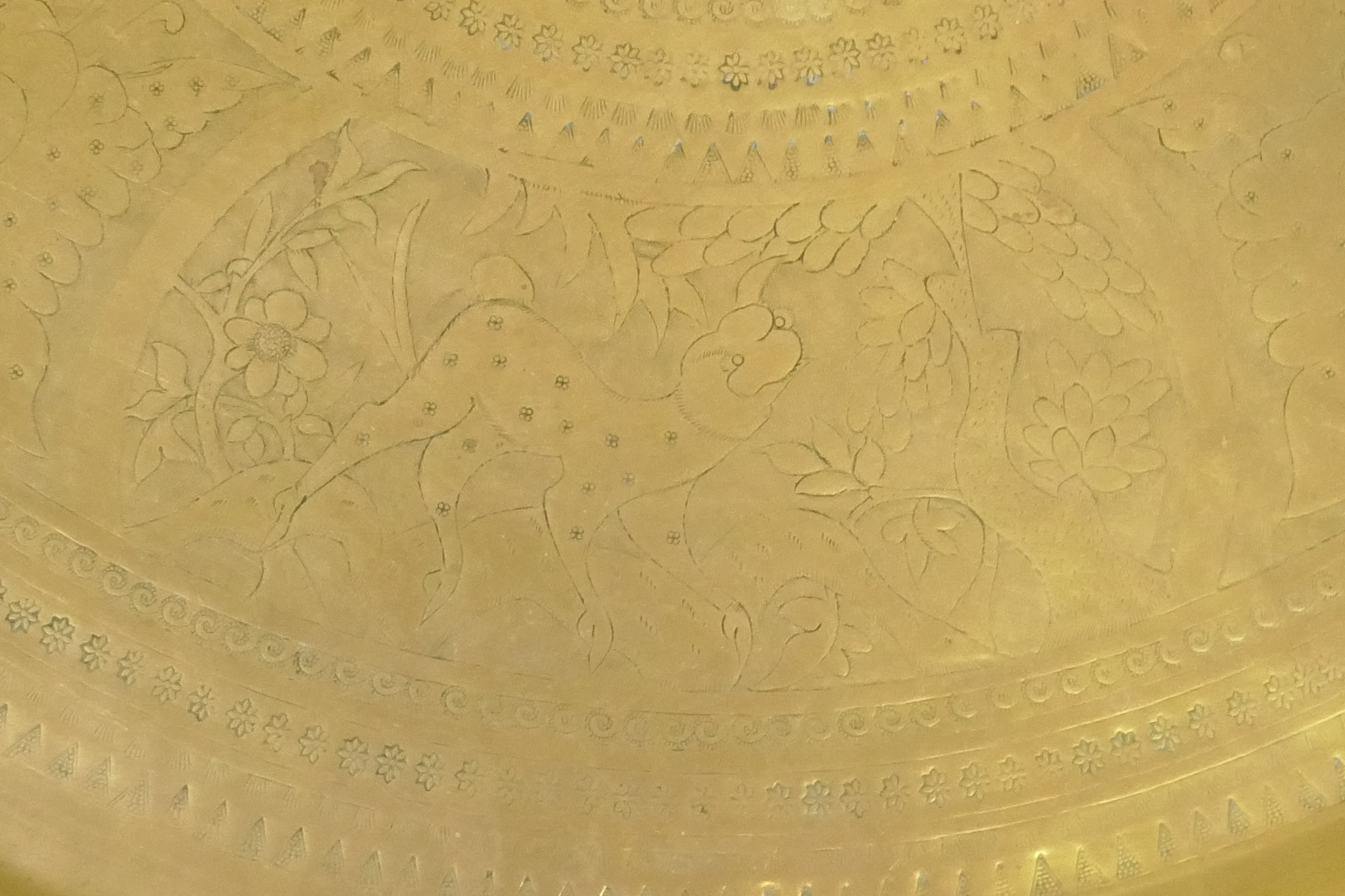 An Islamic brass tray with script decoration, together with another larger decorated with Islamic - Image 7 of 9