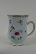 A late C18th/early C19th Chinese export ceramic tankard with enamel decoration of butterflies and