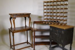 An oak cupboard with linen fold decoration, 50 x 36 x 70cm, a wine rack, side table and open