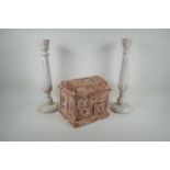 A pair of painted and distressed turned wood pricket candle sticks, and a metal strapped and