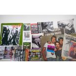 A quantity of punk ephemera to include shop display signs, stickers, flyers, press photos, newspaper