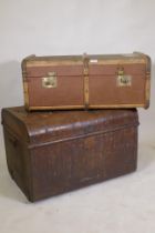 An antique wood travelling trunk with canvas covers and metal mounts, 76 x 50 x 33cm, and a tin