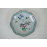 A C19th Chinese porcelain dish with frilled rim and famille rose enamel floral decoration, AF,
