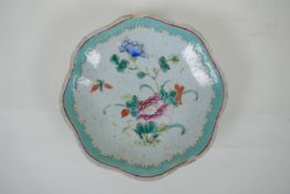 A C19th Chinese porcelain dish with frilled rim and famille rose enamel floral decoration, AF,