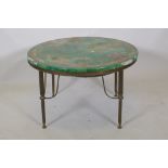 A marble top occasional table, raised on a brass base, the top with faux malachite and chinoiserie