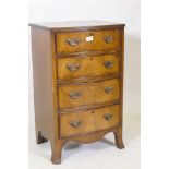 A mahogany bowfront chest of drawers raised on swept feet, 47 x 39cm, 77cm high