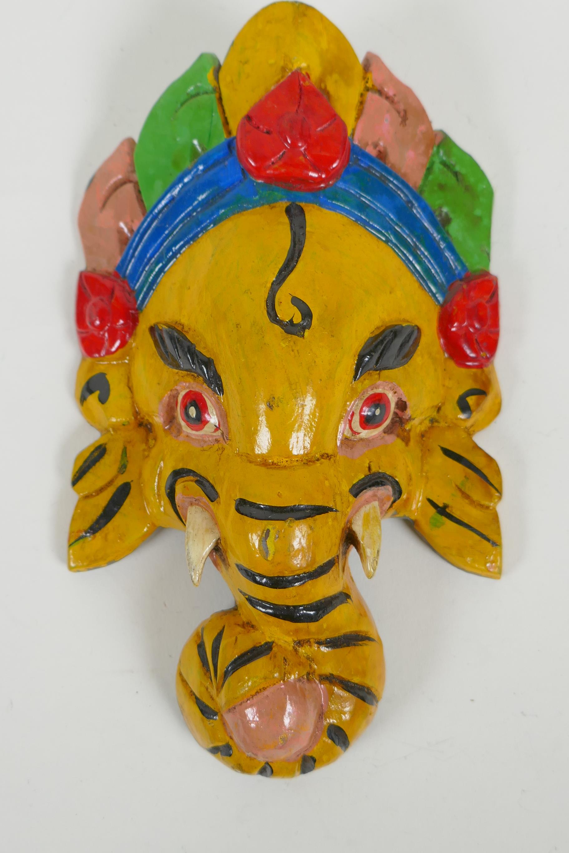 An Indian carved and painted wood Ganesh wall mask and another carved and gilt Buddha mask, - Image 3 of 3