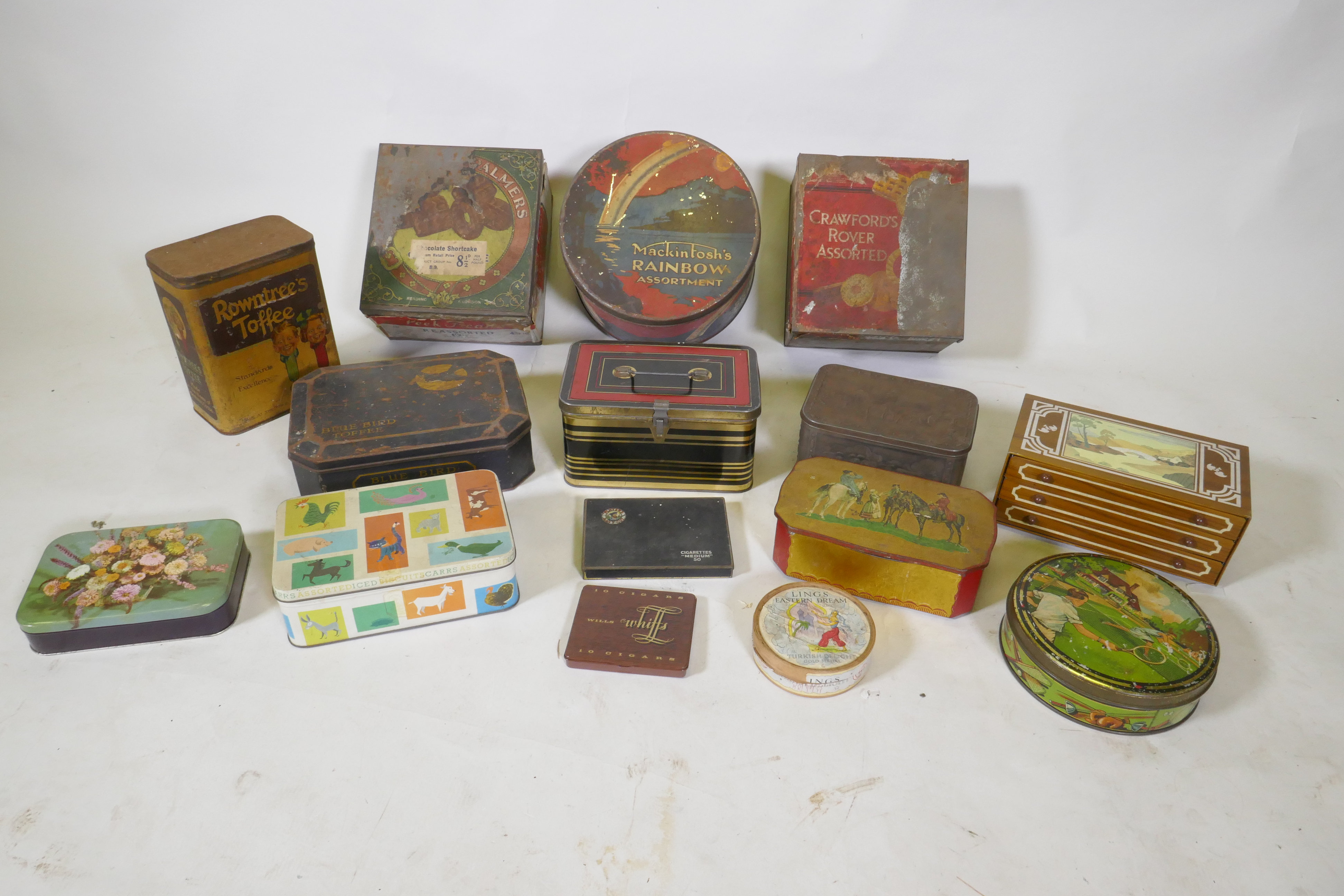 A quantity of vintage biscuit cigarette and toffee tins, largest 22 x 25cm