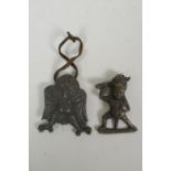 A Tibetan moulded metal Garuda pendant and another of a wrathful deity, 6 x 6cm