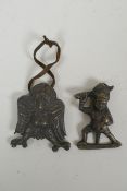 A Tibetan moulded metal Garuda pendant and another of a wrathful deity, 6 x 6cm
