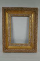 An C18th/C19th carved giltwood picture frame, requires some re-gilding, rebate 37 x 26cm