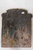 A cast iron fire back with raised decoration of a phoenix rising from the flames, 44 x 58cm