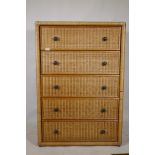 A rattan five drawer chest, 87 x 46 x 126cm